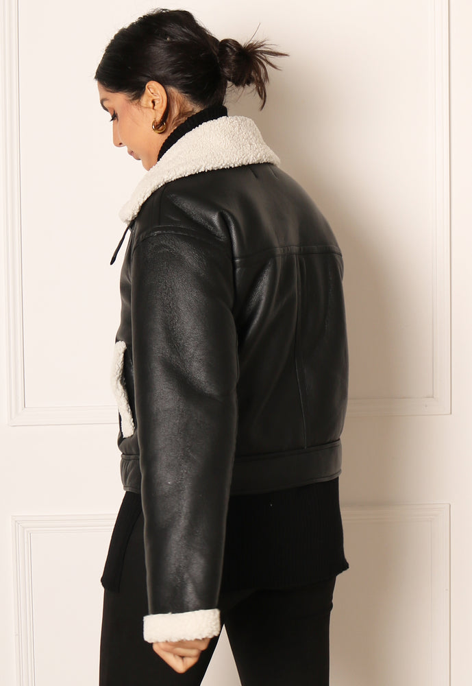 
                  
                    PIECES Janelle Faux Leather & Shearling Aviator Coat in Black & Cream - One Nation Clothing
                  
                