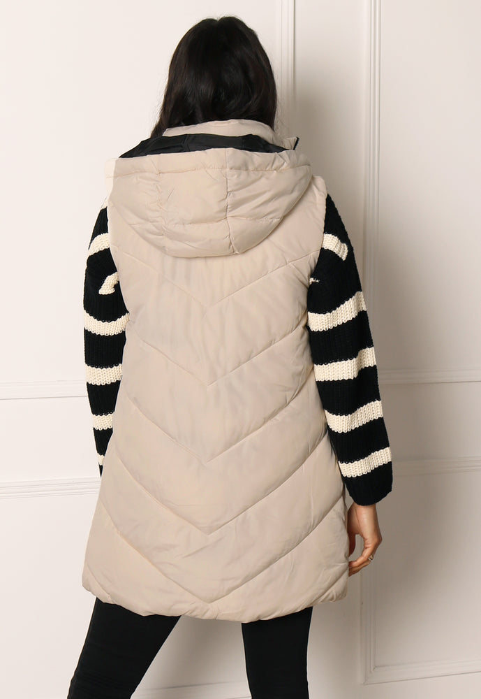 
                  
                    JDY Skylar Chevron Quilted Puffer Gilet with Hood in Soft Beige - One Nation Clothing
                  
                