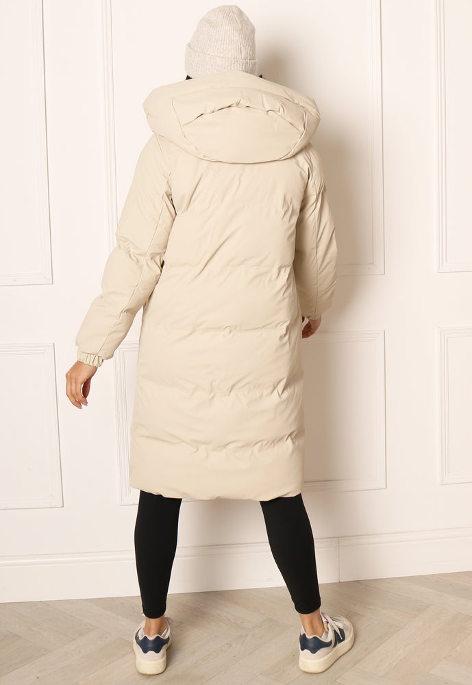 
                  
                    VERO MODA Long Noe Water Repellent Quilted Hooded Midi Puffer Coat in Soft Beige - One Nation Clothing
                  
                