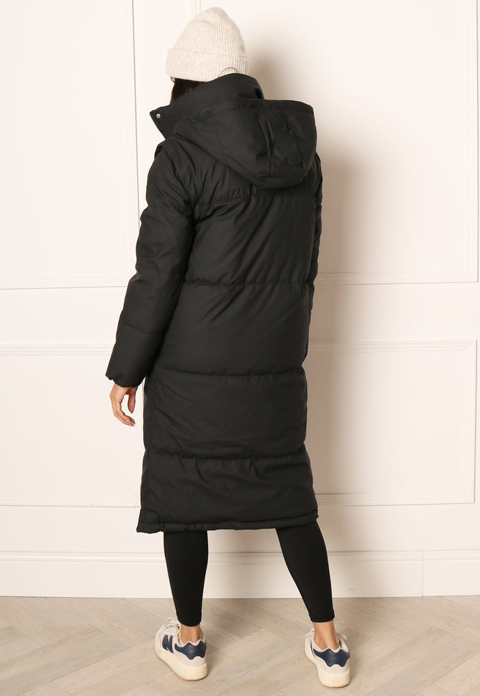 
                  
                    ONLY Sally 2 in 1 Water Repellent Quilted Long Hooded Puffer Coat & Gilet in Black - One Nation Clothing
                  
                