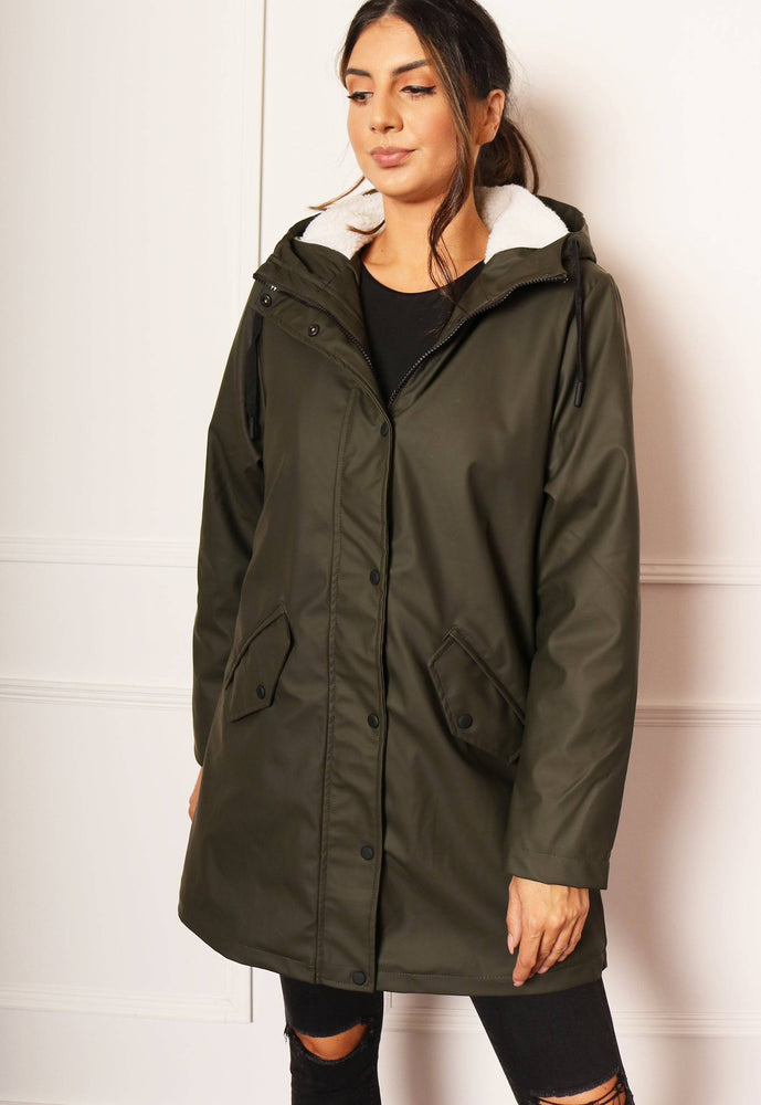 
                  
                    ONLY Sally Rubberised Matte Hooded Raincoat Mac with Shearling Lining in Khaki - One Nation Clothing
                  
                