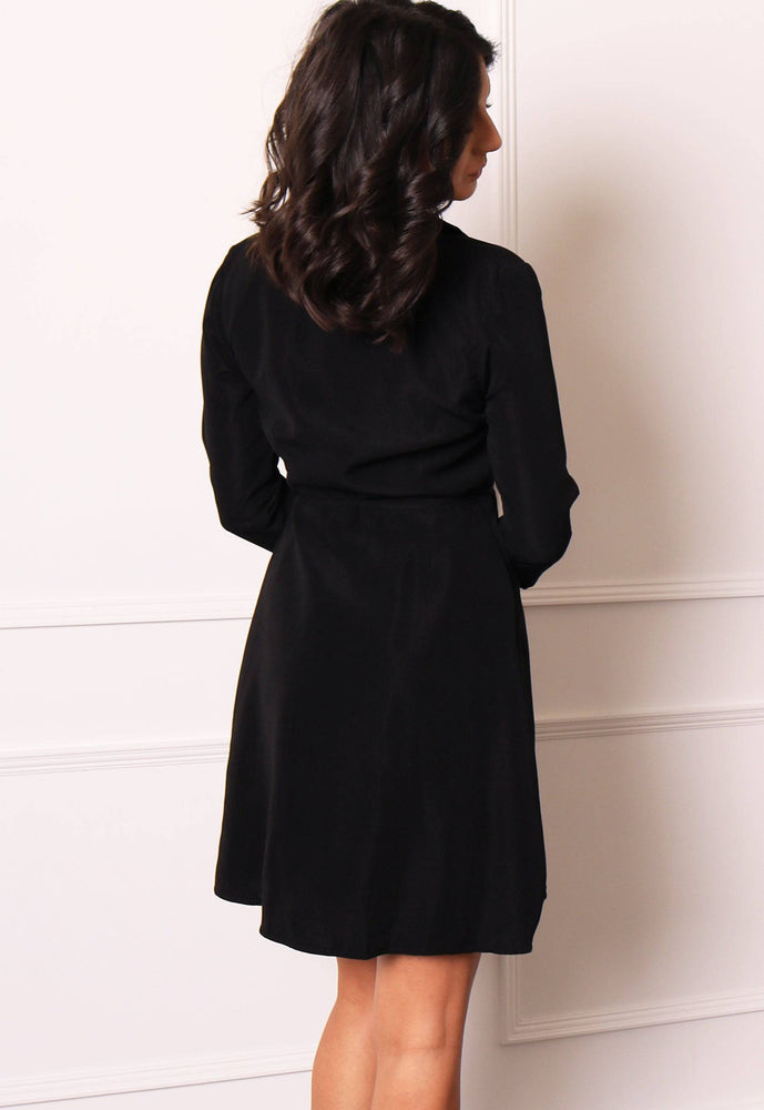 
                  
                    Three Quarter Sleeve Collared Tuxedo Style Mini Wrap Dress in Black - One Nation Clothing
                  
                