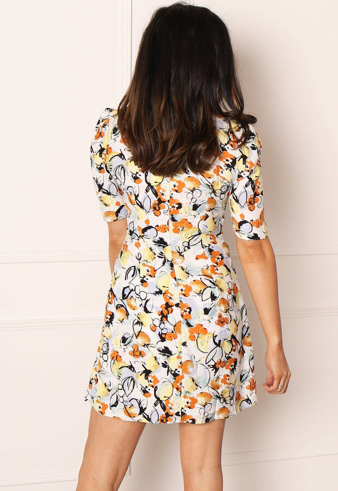 
                  
                    GLAMOROUS Fruit Print Linen Look Tie Front Short Sleeve Mini Dress in White, Yellow & Orange - One Nation Clothing
                  
                