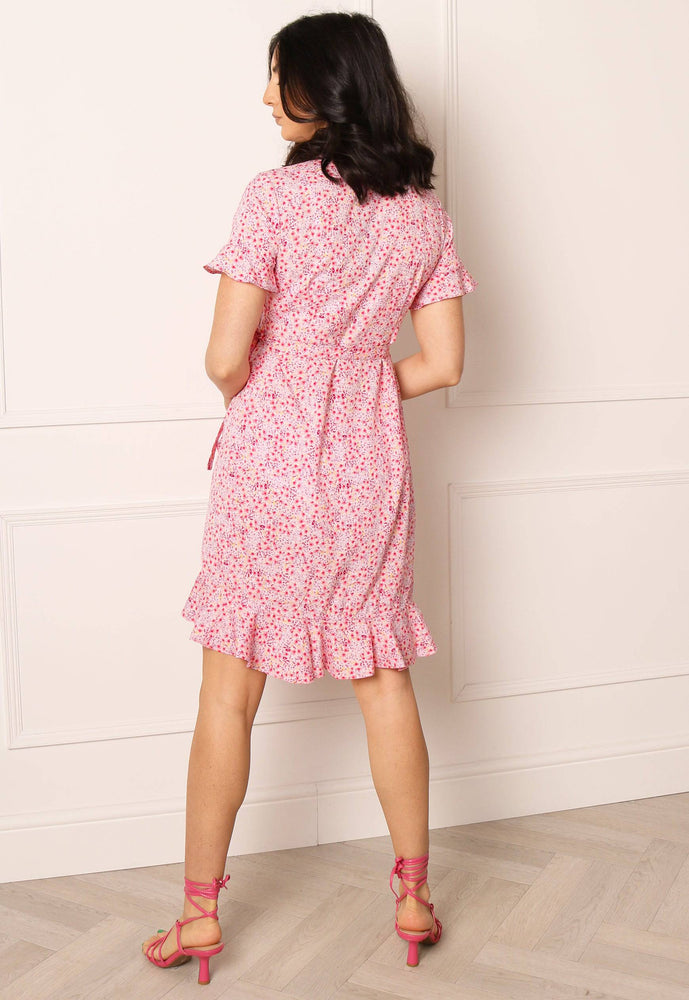 
                  
                    VERO MODA Henna Ditsy Floral Print Mini Frill Wrap Dress in Pink - One Nation Clothing
                  
                