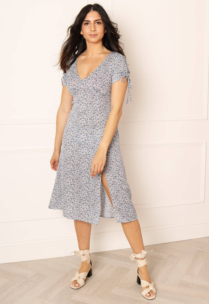 
                  
                    Ditsy Floral Midi Tea Dress with Thigh Split in Blue - One Nation Clothing
                  
                