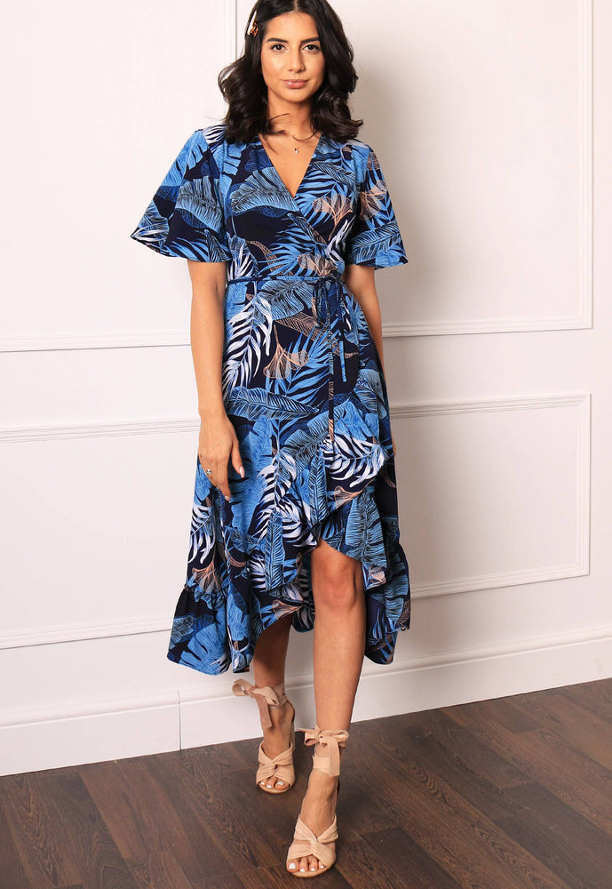 
                  
                    Palm Leaf Print Wrap Over Midi Dress with Frill Skirt & Short Angel Sleeve in Navy Blue - One Nation Clothing
                  
                