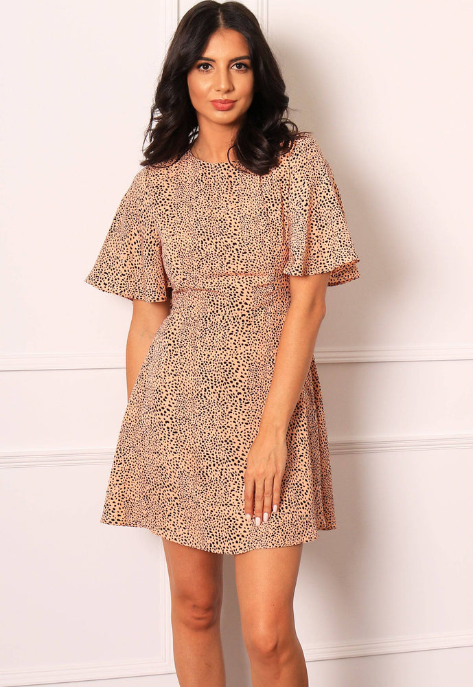 
                  
                    Dalmatian Print Fit & Flare Mini Dress with Short Angel Sleeve in Nude & Black - One Nation Clothing
                  
                