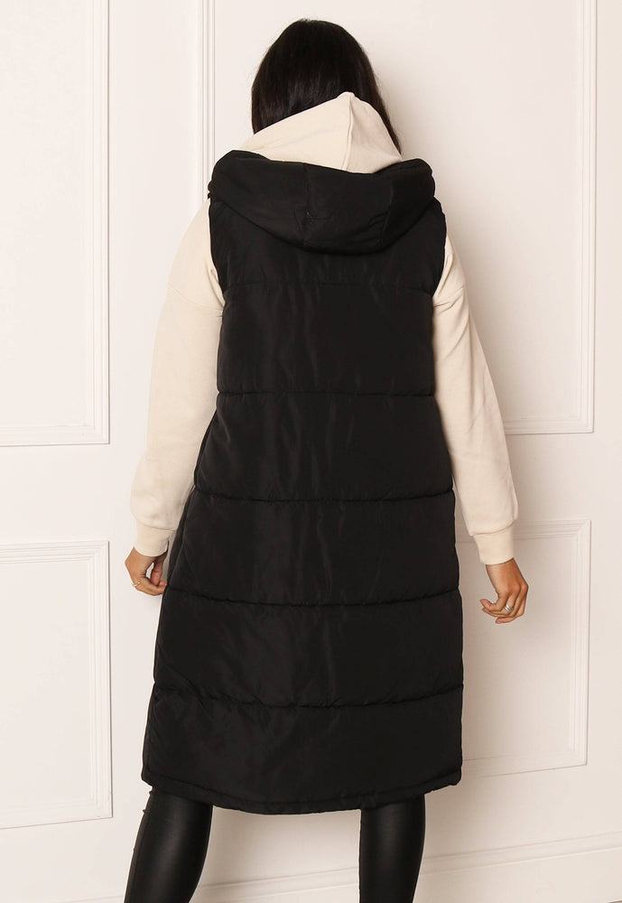 
                  
                    ONLY Alina Longline Midi Padded Puffer Sleeveless Gilet with Hood in Black - One Nation Clothing
                  
                