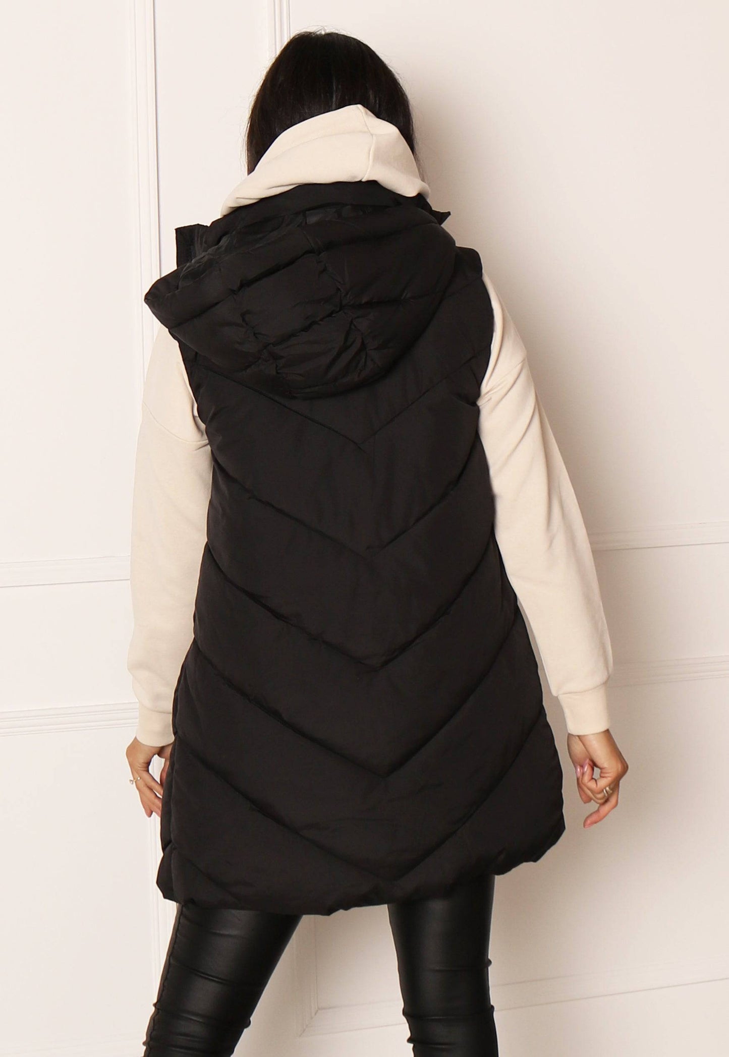 JDY Skylar Chevron Quilted Puffer Gilet with Hood in Black - One Nation Clothing