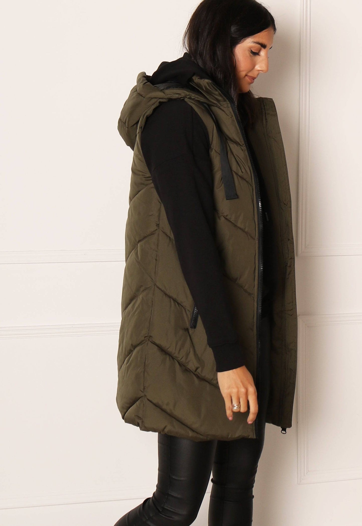 
                  
                    JDY Skylar Chevron Quilted Puffer Gilet with Hood in Khaki - One Nation Clothing
                  
                