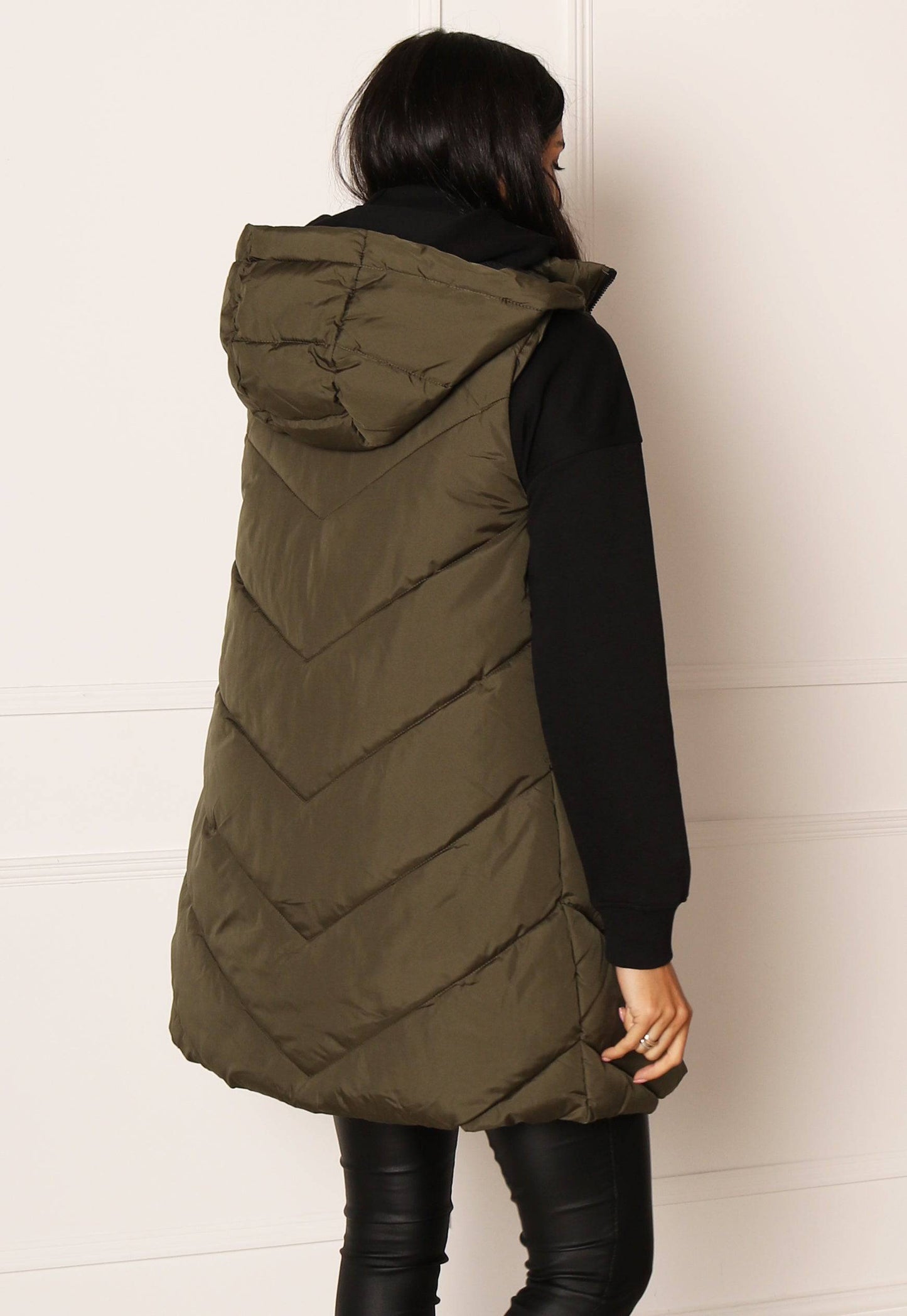
                  
                    JDY Skylar Chevron Quilted Puffer Gilet with Hood in Khaki - One Nation Clothing
                  
                