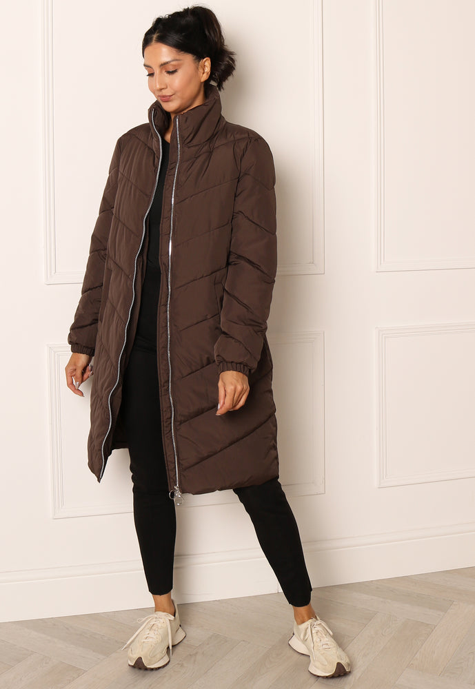 
                  
                    JDY Finno Longline Padded Puffer Coat in Brown - One Nation Clothing
                  
                