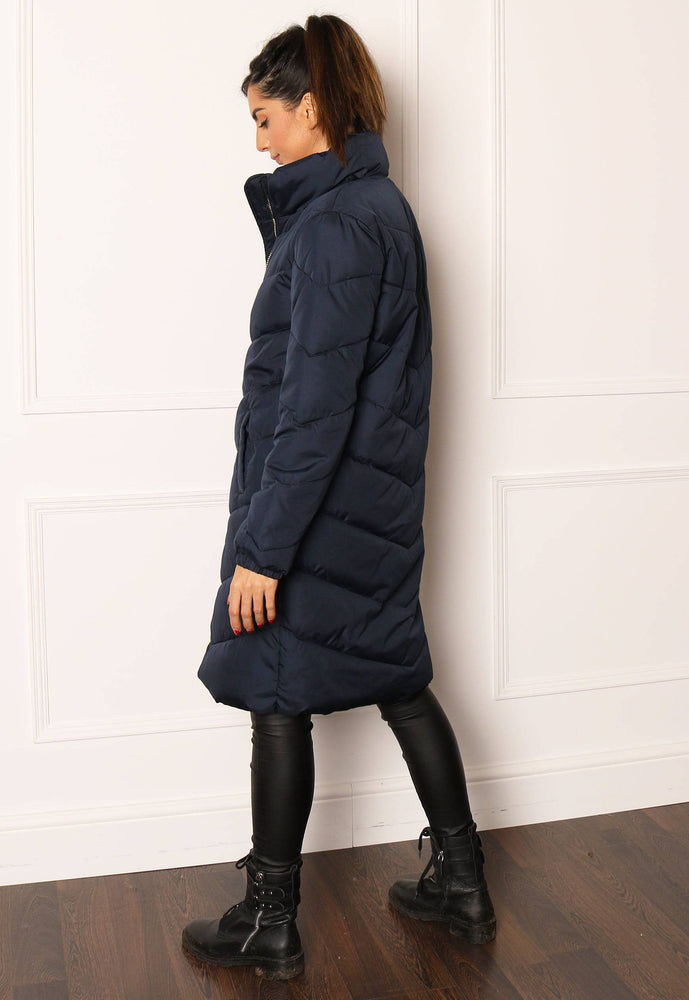 
                  
                    JDY Finno Longline Padded Puffer Coat in Navy - One Nation Clothing
                  
                