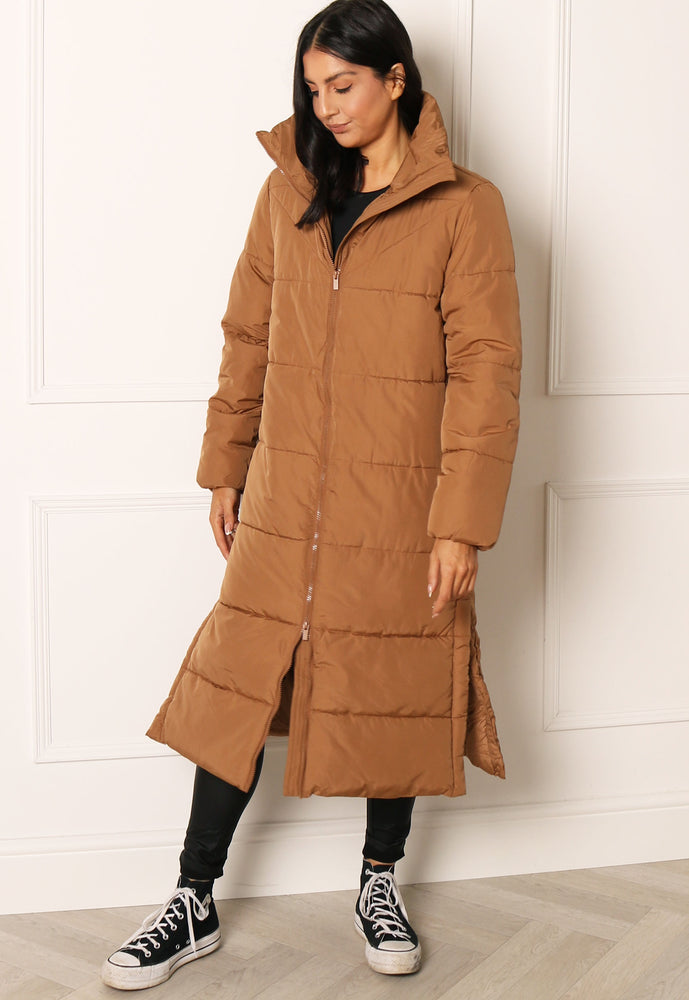 
                  
                    VILA Nilly Longline Midi Padded Puffer Coat with Funnel Neck in Tan - One Nation Clothing
                  
                