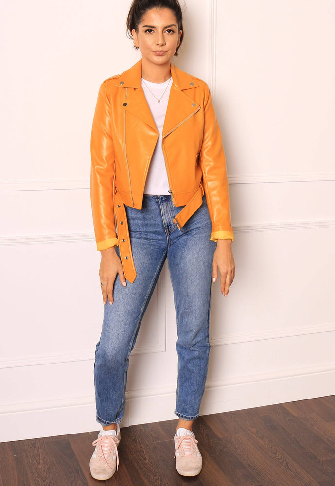 
                  
                    Leather Look Belted Biker Jacket with Asymmetric Zip in Mustard - One Nation Clothing
                  
                