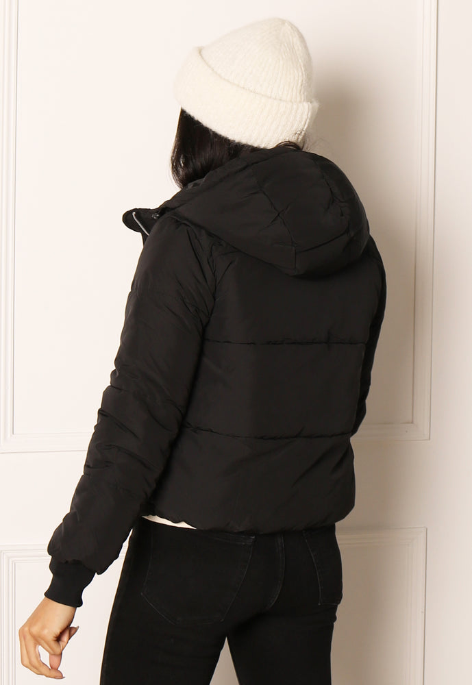 
                  
                    JDY Erica Hooded Boxy Short Padded Puffer Funnel Neck Jacket in Black - One Nation Clothing
                  
                