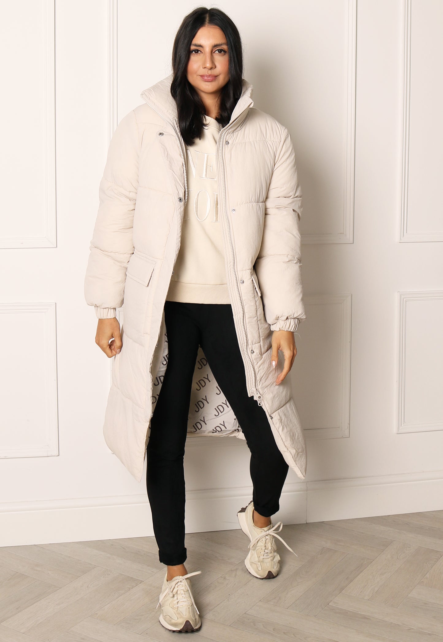 
                  
                    JDY Lenora Oversized Longline Puffer Coat with Pockets in Cream - One Nation Clothing
                  
                