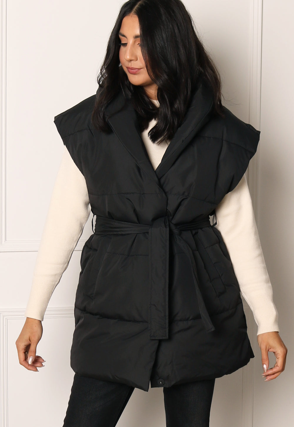 VILA Loui Longline Belted Puffer Sleeveless Puffer Gilet with Shawl Collar in Black - One Nation Clothing
