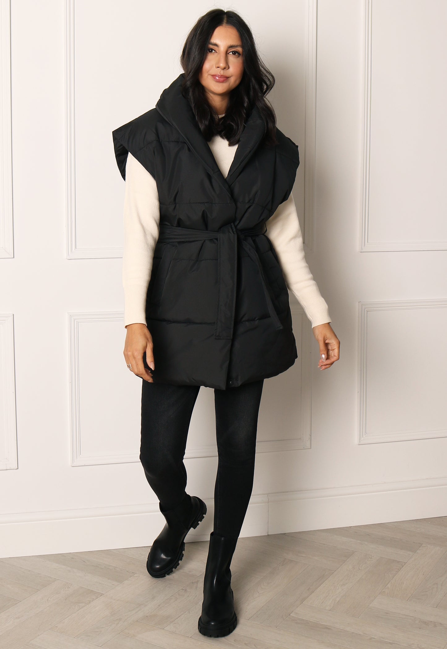 
                  
                    VILA Loui Longline Belted Puffer Sleeveless Puffer Gilet with Shawl Collar in Black - One Nation Clothing
                  
                