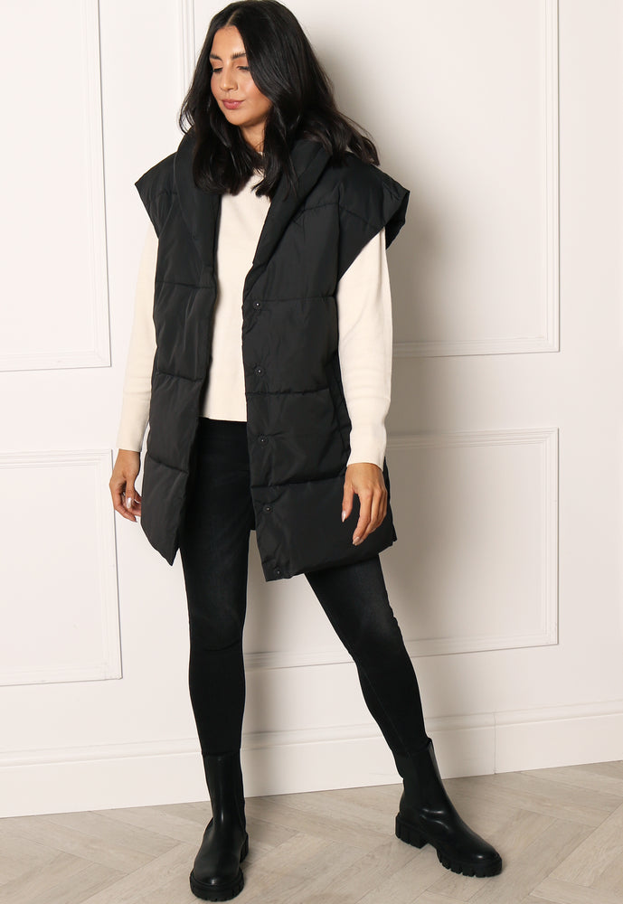VILA Loui Longline Belted Puffer Sleeveless Puffer Gilet with Shawl Collar in Black - One Nation Clothing