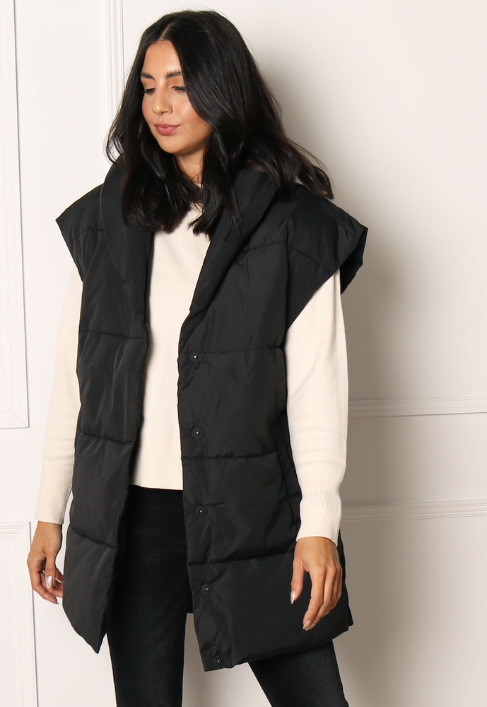 
                  
                    VILA Loui Longline Belted Puffer Sleeveless Puffer Gilet with Shawl Collar in Black - One Nation Clothing
                  
                