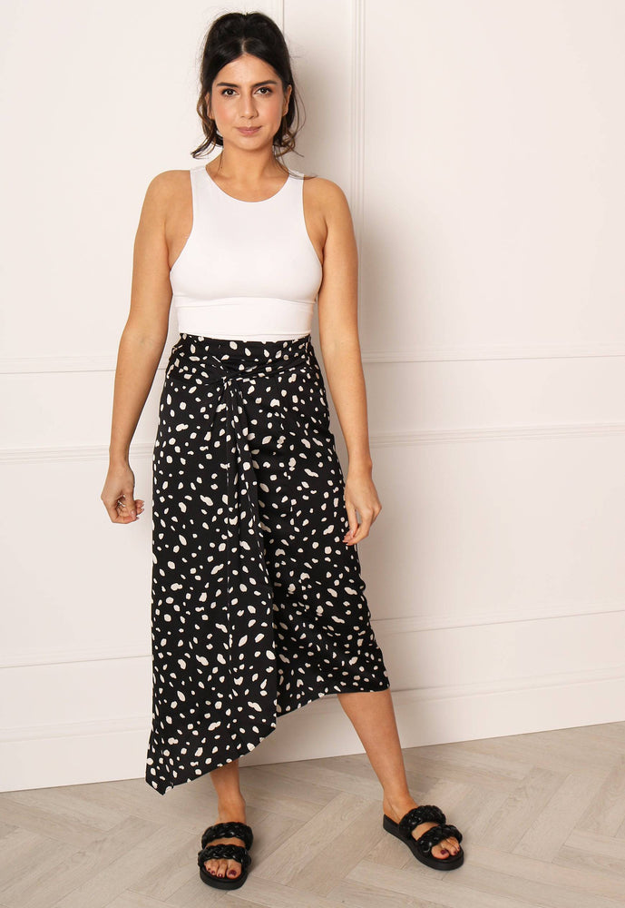 
                  
                    VERO MODA Satin Dalmatian Print Asymmetric Hem Wrap Midi Skirt in Black & White - One Nation Clothing
                  
                