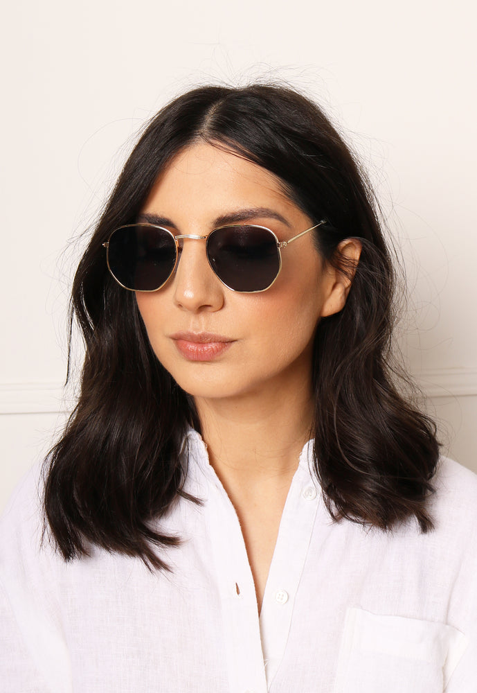 
                  
                    Raya Hexagonal Flat Lens Metal Trim Sunglasses in Grey & Gold - One Nation Clothing
                  
                