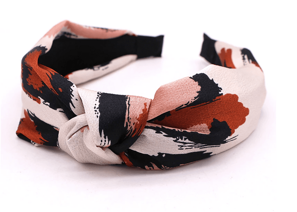 
                  
                    Leopard Print Satin Knot Headband in Cream, Black, Pink & Rust - One Nation Clothing
                  
                