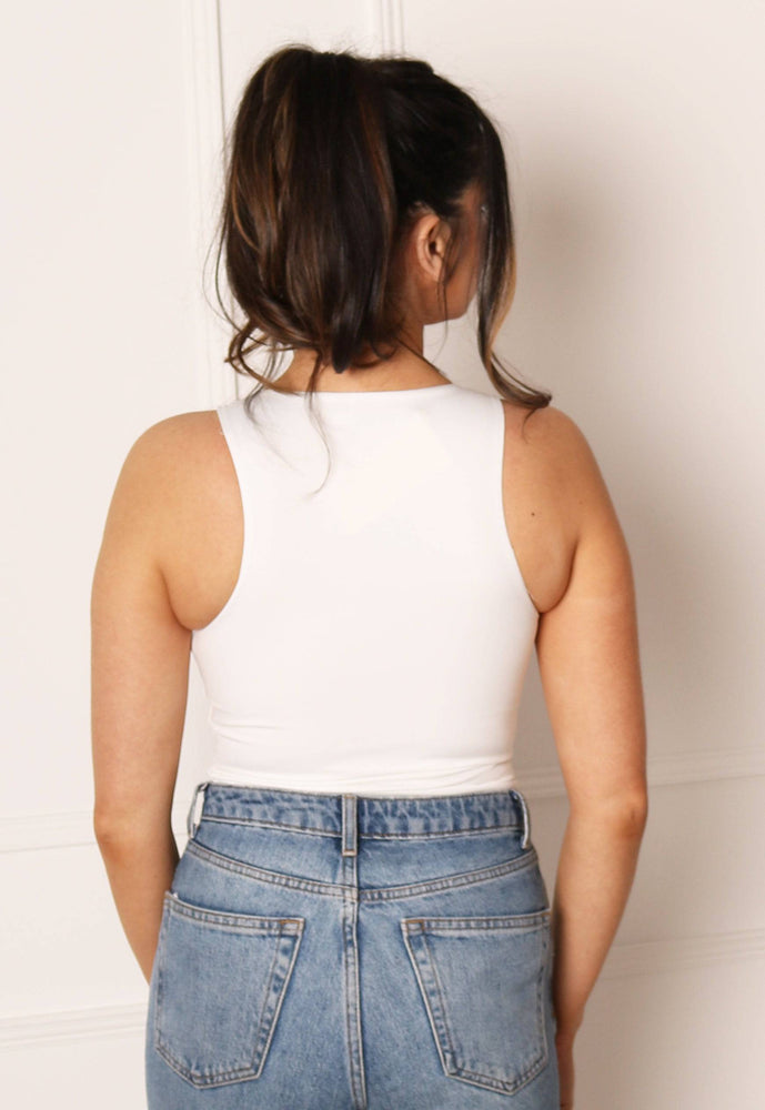 
                  
                    Racer Neck Double Layer Sleeveless Bodysuit in Soft Cream - One Nation Clothing
                  
                
