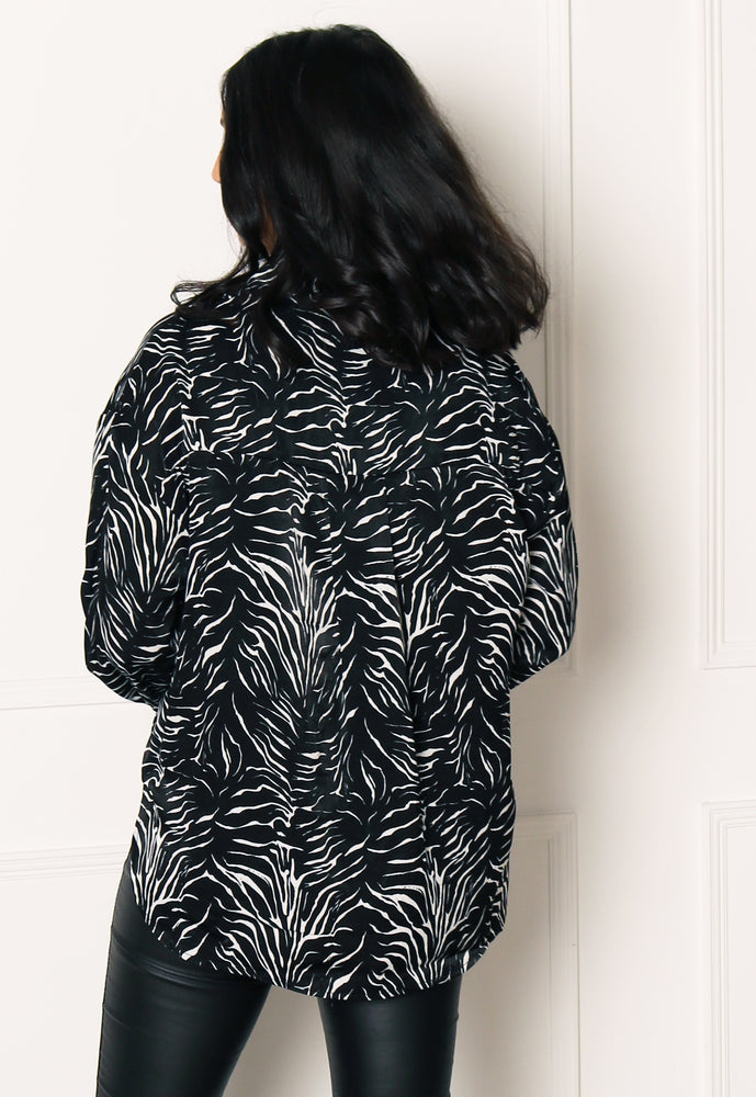 
                  
                    ONLY Mille Animal Print Dip Hem Long Sleeve Shirt in Black - One Nation Clothing
                  
                