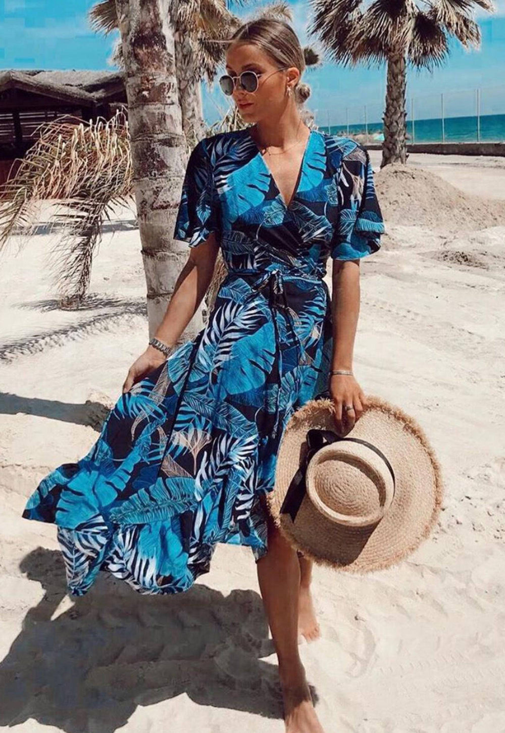 Palm Leaf Print Wrap Over Midi Dress with Frill Skirt & Short Angel Sleeve in Navy Blue - One Nation Clothing